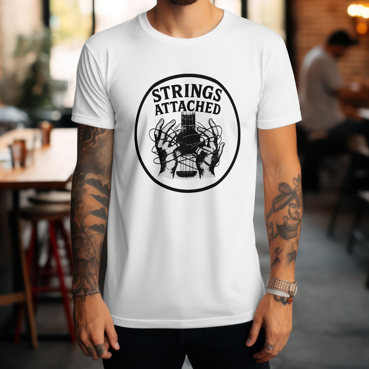 Strings attached t-shirt with guitar humour pun design for musicians